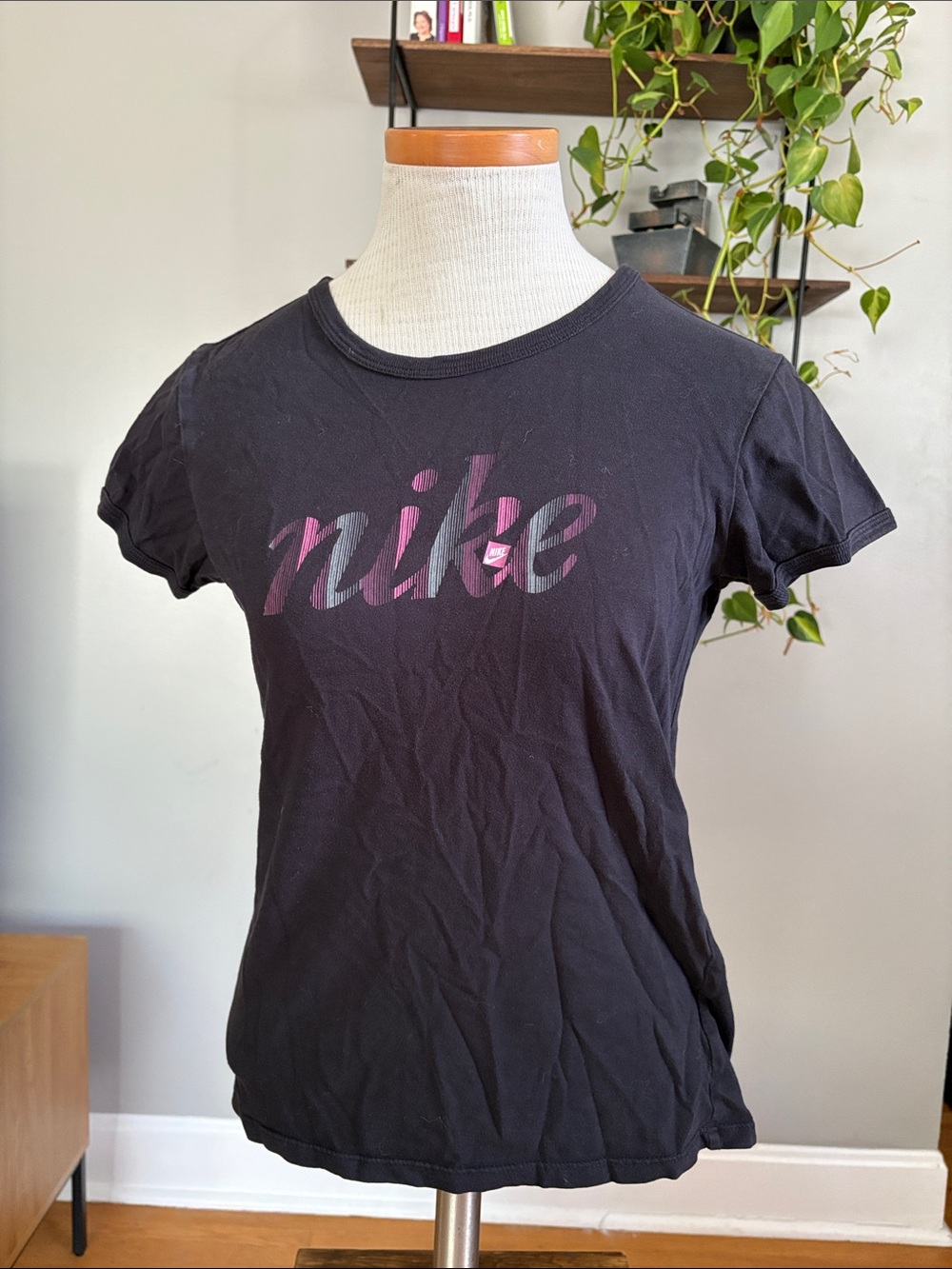 Nike Womenβs Black Short-Sleeve Tee with Pink Logo